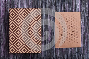 Envelope of Kraft paper. Love letter envelope. Wooden background. A holiday gift box. Gift with the letter.