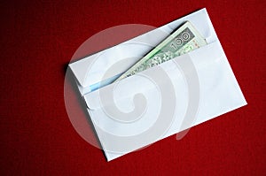 Envelope with polish zloty banknotes