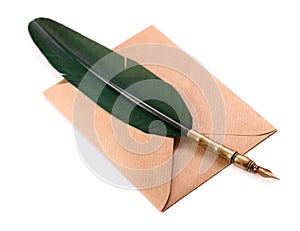 Envelope and quill pen isolated