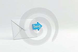 Envelope with a send button on a white background. Space for text.