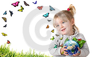 Environment concept, child holding earth with flying butterflies