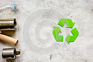 Environment concept with recycling symbol on stone background top view mock-up