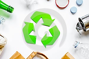 Environment concept with recycling symbol on white background to