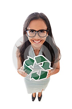 Environment, eco li full length of mixed race asian/caucasian woman in glasses showing green recycling sign