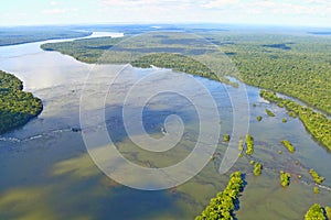 Iguacu river crossing the forest. Mata Atlantica preserved with an aerial view. Environmental protection, ecology, clean air. photo