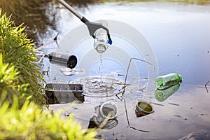 Environmental conservation collecting garbage and trash from water