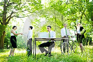 Environmental Friendly Themed Picture Of Business People Working