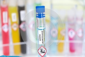 environmental hazard chemical and symbol in test tube