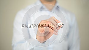 Environmental Law, man writing on transparent screen