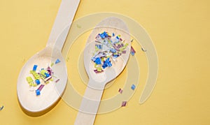 Environmental pollution and water microplastic. Micro plastic with spoon