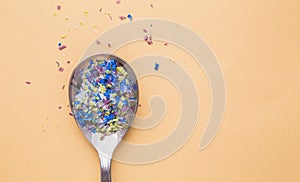 Environmental pollution and water microplastic. Micro plastic with spoon