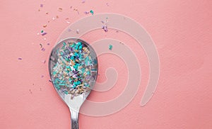 Environmental pollution and water microplastic. Micro plastic with spoon