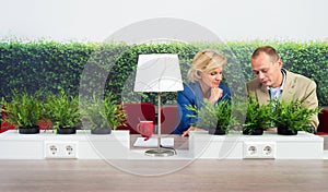 Environmentalists Working At Desk In Office