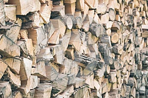 Environmentally friendly fuel. Firewood for a rustic stove. Wood texture. Rustic background Ecologicaly clean fuel photo
