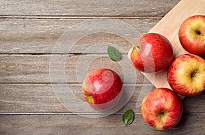 Envy apples on wooden table