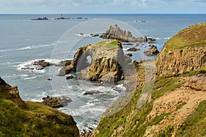 The Enys Dodman Arch at Land`s End, a headland and holiday complex in western Cornwall, England