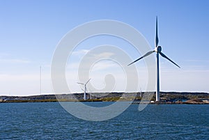 Eolian field and wind turbines photo