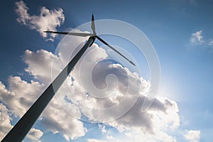 Eolian turbine in sky photo