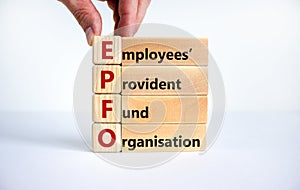 EPFO, employees provident fund organisation symbol. Wooden cubes with words `EPFO, employees provident fund organisation.