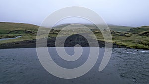 Epic Aerial Iceland Remote Landscape Flyover Rivers and Green Grass in Blue Dusk Sunset