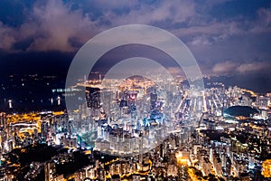 Epic aerial view of night scene of Victoria Harbour, Hong Kong