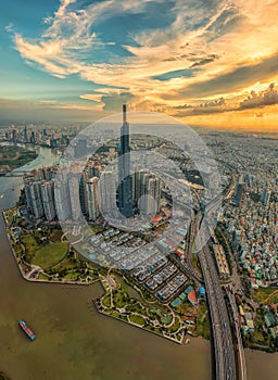 Epic cityscape photo of Saigon skyline at sunset evening