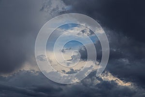 Epic Dramatic Storm sky, dark gray fluffy cumulus clouds background texture, thunderstorm