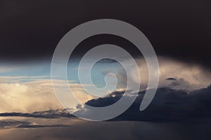 Epic dramatic Storm sky, dark and white big cumulus clouds on blue sky background texture