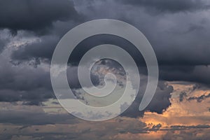 Epic dramatic Storm sky on sunset, dark blue grey cumulus clouds background texture