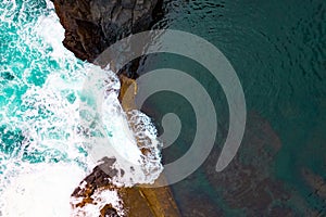 Epic natural pool with great wave. View from drone in Madeira