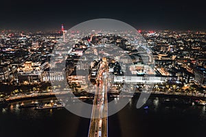 Epic night aerial view of the London, River Thames, London Eye. Panorama cityscape