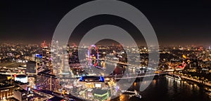 Epic night aerial view of the London, River Thames, London Eye. Panorama cityscape