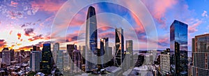 Epic panorama of a pink and blue sunset over San Francisco skyline with Salesforce Tower in the center and the bay bridge