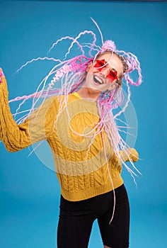 Epic portrait of happy woman dancing, excited emotional person. Young student