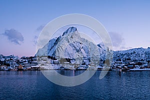 The epic snow covered mountains of the Lofoten Islands. Reine, Norway