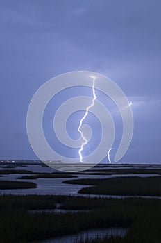 An Epic Thunderstorm Produces Lightning Strikes Hitting Galveston Texas