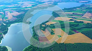 Epic Top Down Aerial View of Big Lake With Clear Blue Water. Reflection of Sky in Clear Lake in Evening Sunset. Pond Morning