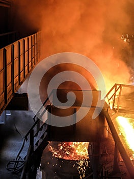 Epic view of blast iron processing (molten metal fire smoke technology)