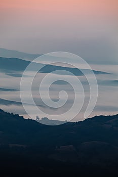 Epic view of a foggy ocean over the land of Bulgaria.