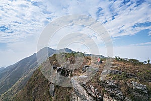 Epic view of hiker man on the mountain of Pat Sin Leng, Tai Po photo