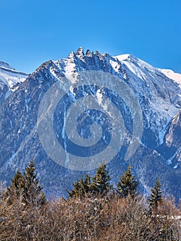 Epic view of pointy rock peaks called Acele Morarului in Bucegi mountains, Romania, in Winter