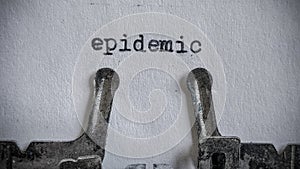 epidemic text typed on blank sheet with an old typewriter in vintage background