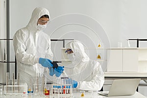 Epidemiological researchers use tablet computers to research chemical compounds on the internet