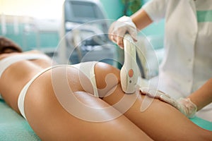 Epilation laser treatment on buttock photo