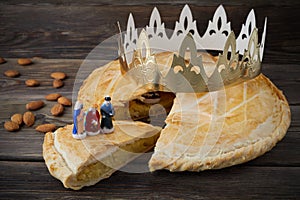 Epiphany cake, French Galette de rois with figure of three kings.