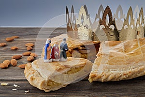 Epiphany cake, French Galette de rois with figure of three kings.