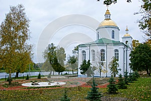 The Epiphany Church in Polotsk, Republic of Belarus with beautiful white walls and golden domes and crosses against the background