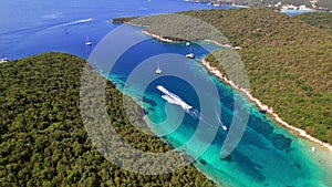 Epirus, Greece. Sivota - stunning aerial drone video of turquoise sea known as Blue Lagoon