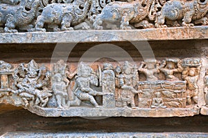 Episode of Bhakta Prahlada being totured in many ways Kedareshwara temple, Halebidu, Karnataka, India