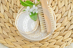 Epsom bath salt and wooden massage foot brush with natural bristles. Eco friendly toiletries set. Natural beauty treatment